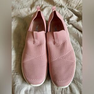 Pink Sketchers Archfit slip on shoes.